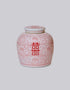 Double Happiness symbol red and white porcelain round storage jar from front