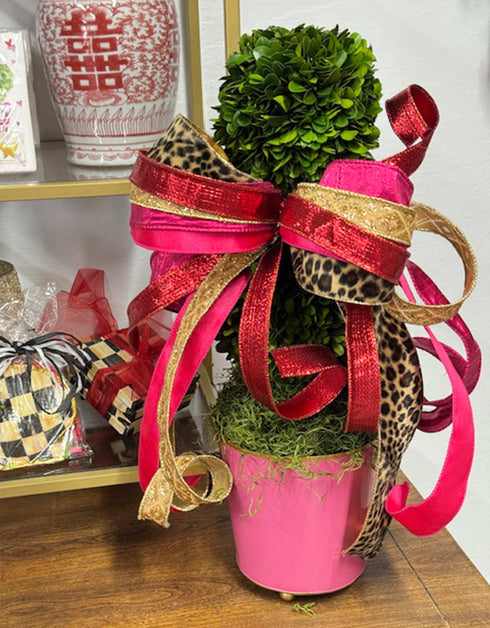 Mattie Round Pink Cachepot with topiary planted inside and styled with a red and pink bow