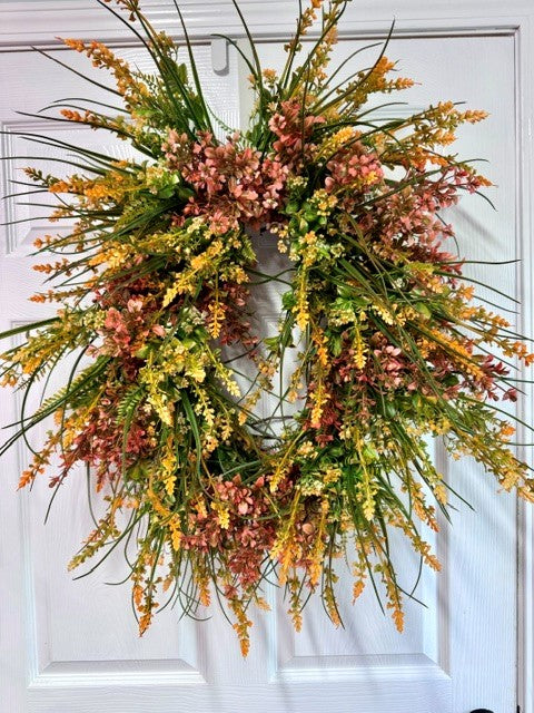 Oval pink/orange mixed greenery wreath